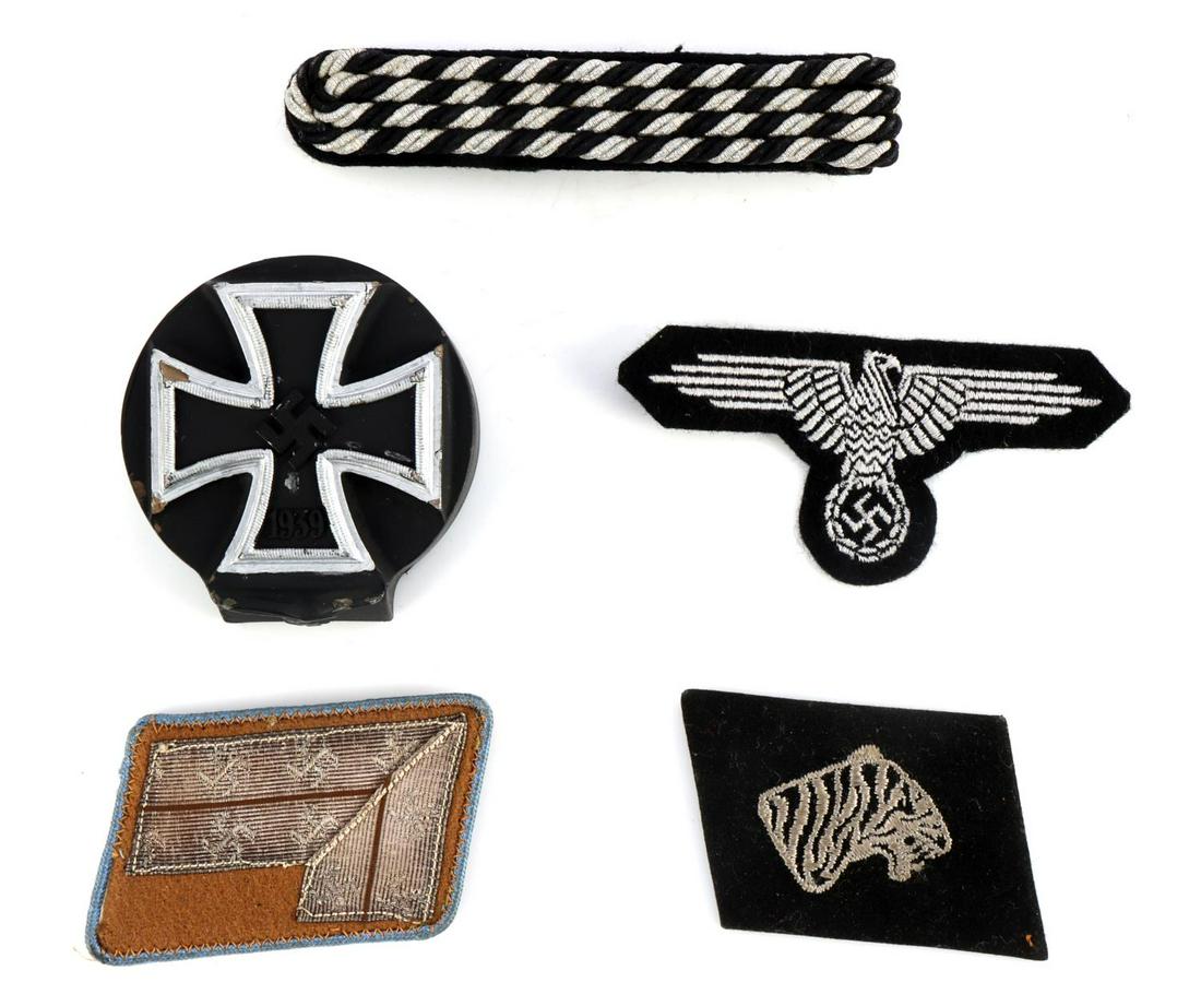 5 WWII GERMAN WAFFEN SS LUFTWAFFE PATCHES: WWII German lot of assorted patches and paper weight. One (1) Waffen-SS Armenian volunteer collar patch with a tiger head. One (1) sleeve eagle. One (1) NSDAP collar tab. Orange with blue piping with 