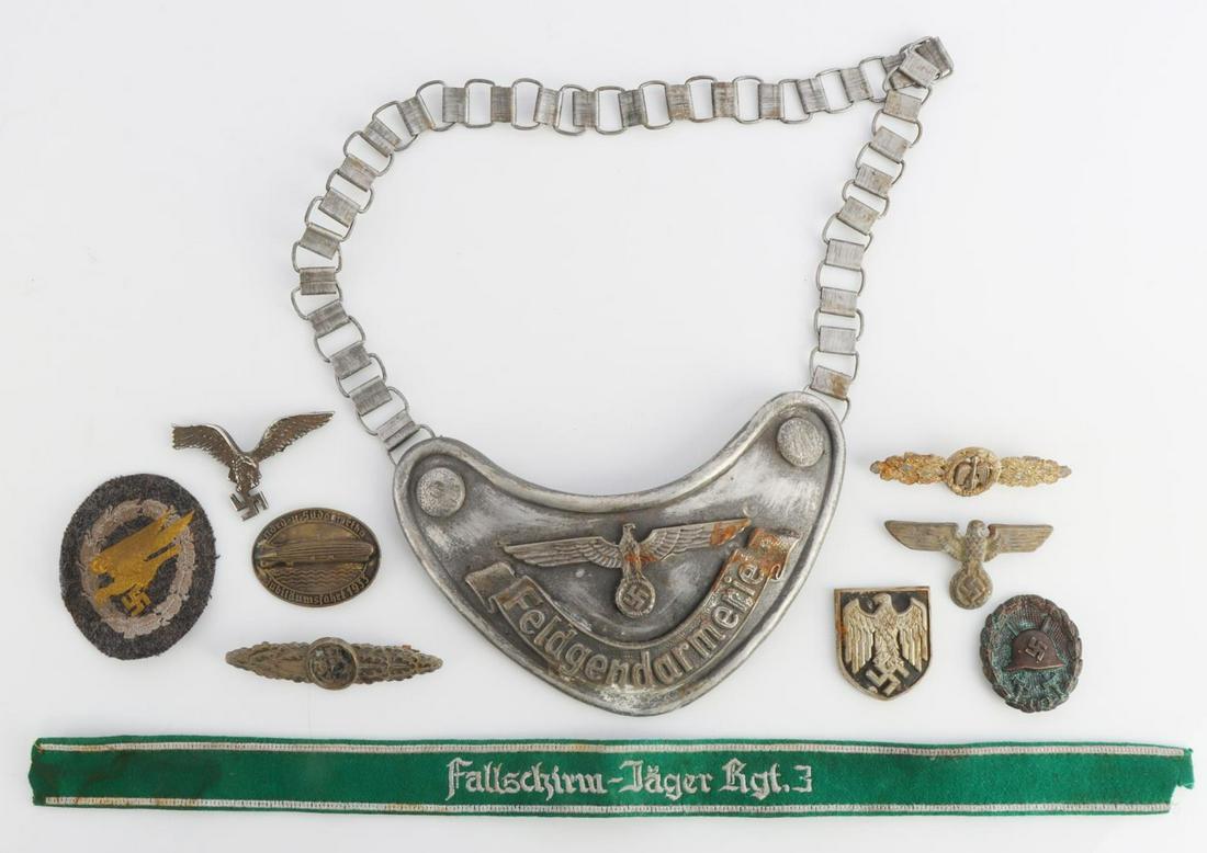 WWII GERMAN THIRD REICH PIN GORGET PATCH LOT OF 10: Lot features a Luftwaffe patch, wound badge, paratrooper cuff title, and a Feldgendarmerie. Measurements 1 - 6 1/2 inches. Good condition. Unauthenticated, sold as is.