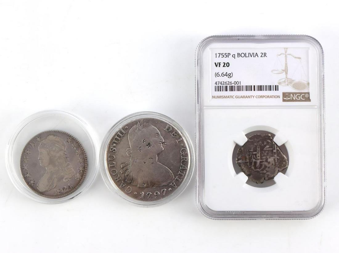1755 & 1791 SILVER COB REALES W 1824 1/2 DOLLAR: 3 Silver US and Spanish coins. NCG graded VF 20 Bolivia. Cob 2 Reales, 1755 (Potosi). 1797 8 Reales silver coin with privy marks to the obverse and an 1824 50c Capped Bust half dollar, approx. (VG).