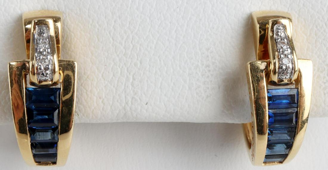 GUY LAROCHE 18K GOLD SAPPHIRE DIAMOND EARRINGS: Huggie hoop earrings are stamped "18K" and "Guy Laroche." Sapphires are baguette cut and channel set. Single point diamonds are prong set in white gold. Earrings measure 16.5 millimeters from top to b