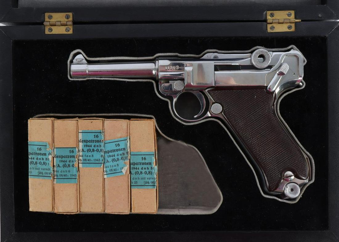 WWII GERMAN KRIEGHOFF 1944 PRESENTATION LUGER PO8: Extremely scarce 1944 Krieghoff make presentation Luger in nickel finish. 4 inch barrel featuring a bright and clear bore. Very smooth action. Pistol is all original, serial number (11263) found on re