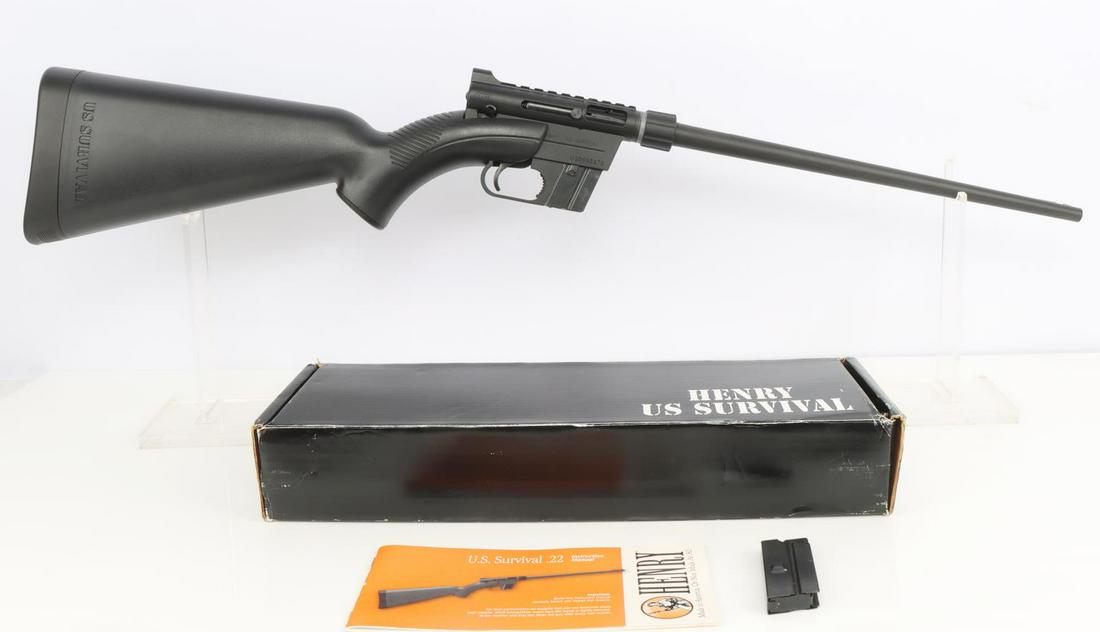 HENRY US SURVIVAL 22 CALIBER TAKE DOWN RIFLE: Henry Repeating Arms U.S. Survival .22LR caliber takedown rifle with two 8-round magazines. Bright and clear bore. 16 inch barrel. Black steel and polymer construction with all part store in the stock