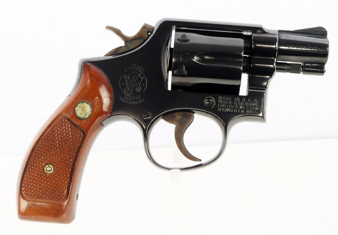 SMITH & WESSON M 10-5 .38 SPCL SNUB NOSE REVOLVER: Finish and wood grips in very good condition. Barrel measures 2 inches long and features a bright and clear bore. Action is smooth and functions without issue. FFL required for transfer. No internatio
