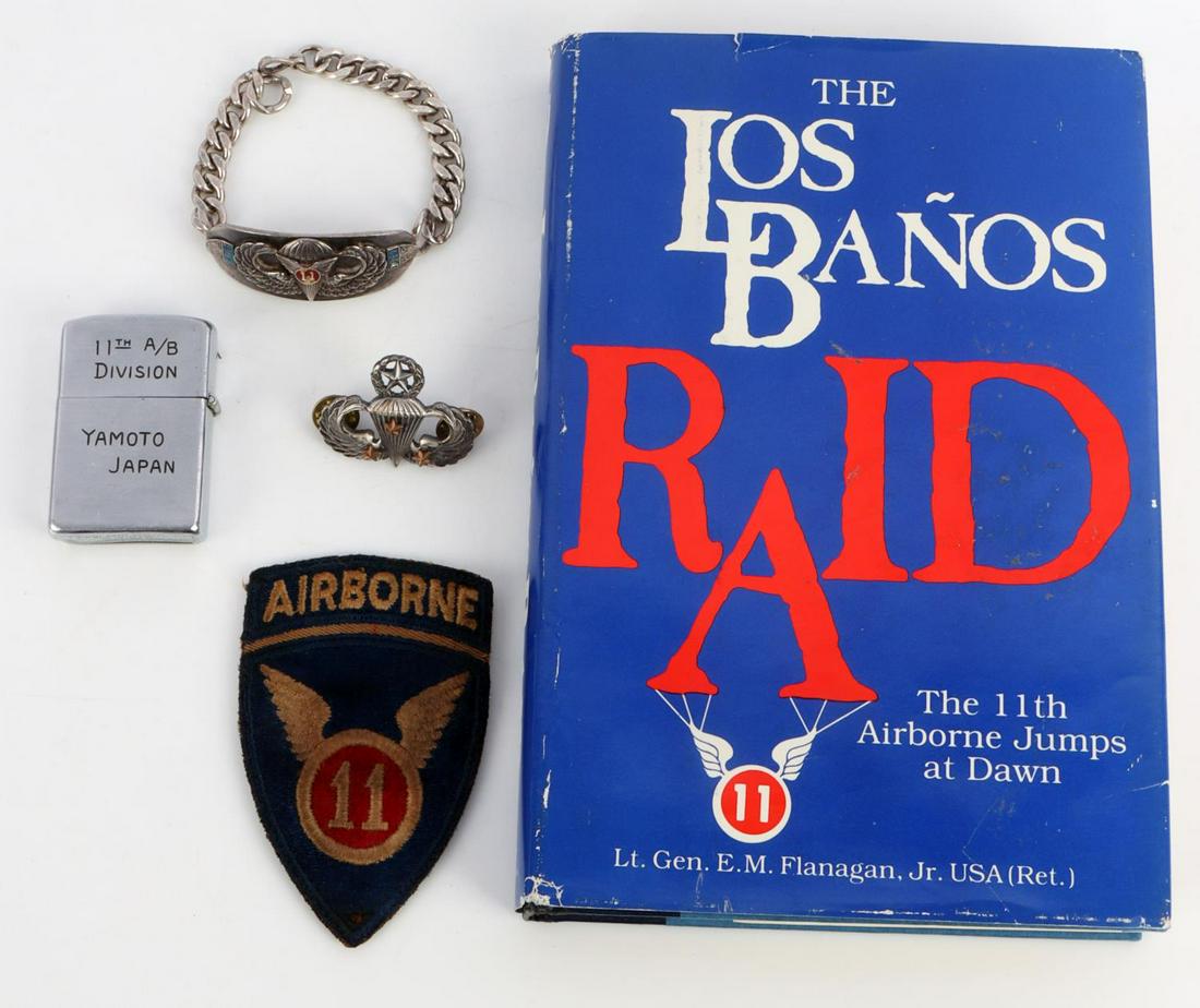 WWII 11TH AIRBORNE DIVISION PATCH ZIPPO BRACELET: 1947 Occupied Japan period Patch, 1947 Zippo with jump sorties Yamoto, Japan, Jump Master wings with 3 battle star, silver stamped and tests sterling ID bracelet, and 11th Airborne Book, "Los Banos Ra