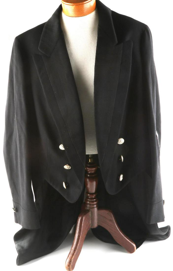 WWII GERMAN THIRDE REICH DIPLOMATIC FROCK COAT: Very good original condition, has loops for a long ribbon bar and name tag. Assman buttons, about a size 40 U.S., free of mothing or detractions, rank shield, does not fluoresce. This lot has a reserv