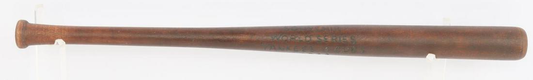 1932 WORLD SERIES SOUVENIR MINI BASEBALL BAT: Bat measures 18 1/2 inches. Very good condition.