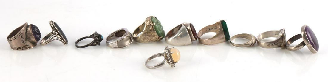11 VINTAGE STERLING SILVER & GEMSTONE RINGS: Sterling silver ring lot includes carved jade, carved amethyst, carnelian intaglio, onyx, malachite, turquoise. Sizes range from 5 to 11. This lot has a reserve.