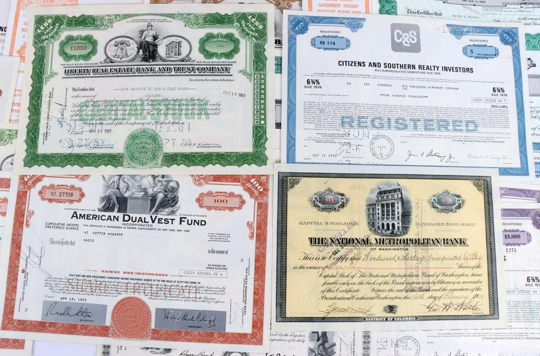 36 BANK FINANCE STOCK CERTIFICATES & LARGE BONDS: Scripophily lot consists of 12 large sized Bonds (1930'2 to 1990's), some with coupons and 23 Bank and Finance stock certificates (1909 to 1970's) including C&S, American Dual Vest, The National Metro