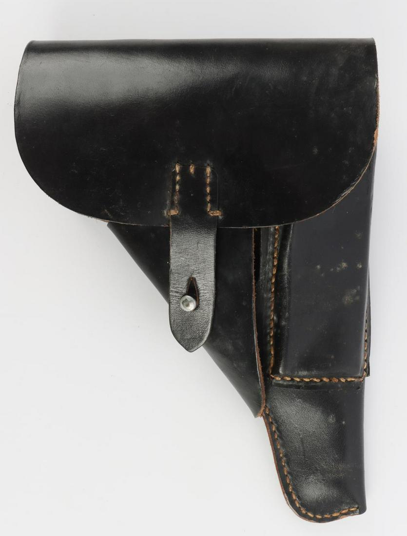 WWII GERMAN THIRD REICH WALTHER P38 HOLSTER: Leather construction. Waffenamt stamped. Also stamped P38 & 0/0833/0007. Measures 9 inches. In very good condition.