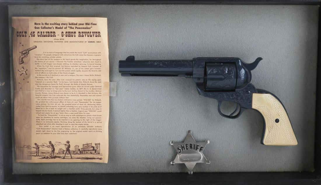 COLT 45 SINGLE ACTION ARMY REVOLVER TOY GUN KIT: 5 inch barrel. 11 inch total length. Comes with case for display measuring 37.5 inches. Very good condition