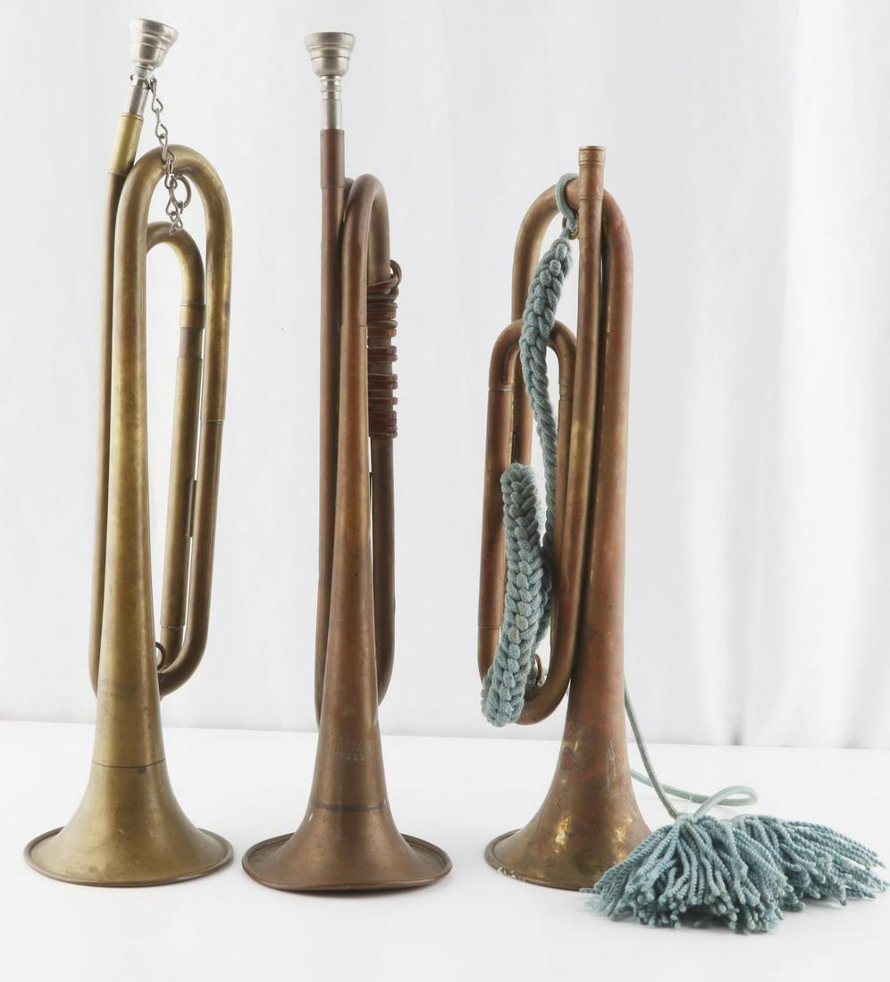 3 MILITARY BUGLE LOT SLINGERLAND U.S. REGULATION: Includes 1 unnamed with sash but no mouthpiece U.S Regulation with braided leather and Slingerland, used but overall good condition
