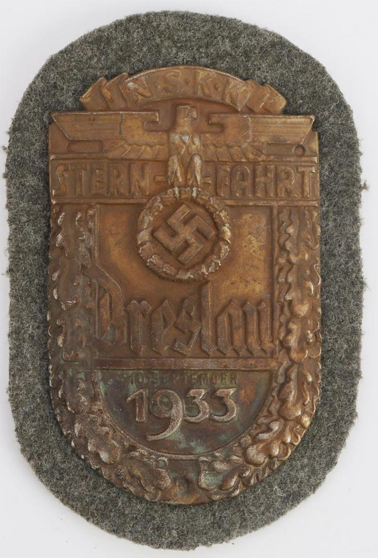 WWII GERMAN THIRD REICH NSKK SLEEVE SHIELD: NSKK stern - fahrt Breslau 1933 sleeve shield patch. FAD marked on reverse. Measures 4 1/4 inches. Very good condition.