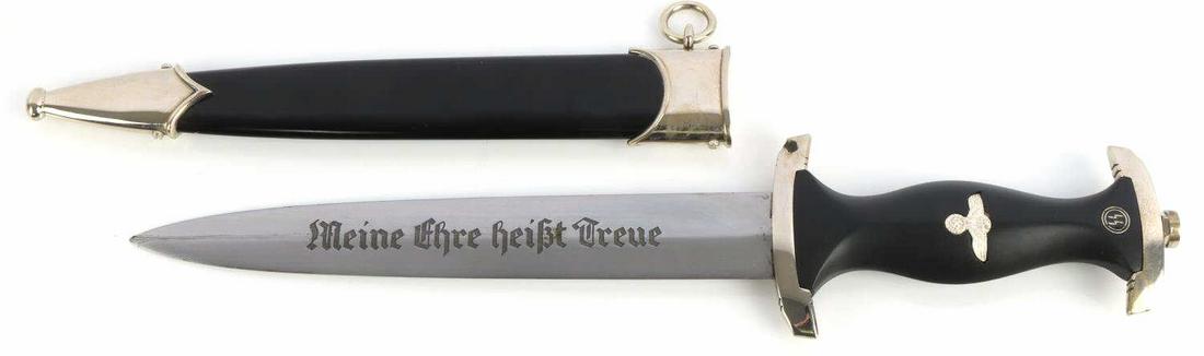 WWII GERMAN WAFFEN SS BOKER DAGGER W SCABBARD: Post-WWII made German Waffen-SS dagger with scabbard. Black wooden handle with SS rune and eagle inserts. Aluminum crossguard and pommel. Bright and clean blade etched "Meine Ehre heisst Treue" and ma