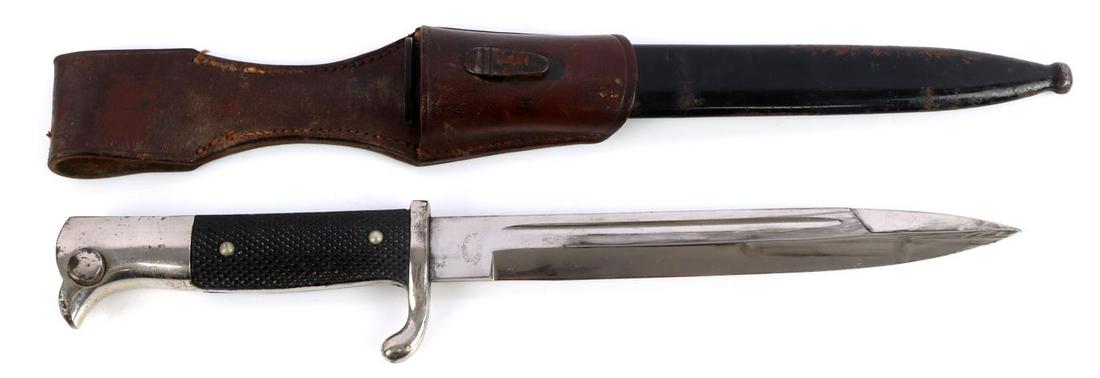 WWII GERMAN THIRD REICH K98 DRESS BAYONET EVERTZ: Steel blade, nickel finger guard and pommel, Bakelite grips. Housed in steel scabbard. Comes with leather frog. Measures 14 inches. Very good condition. Slight oxidation on scabbard.