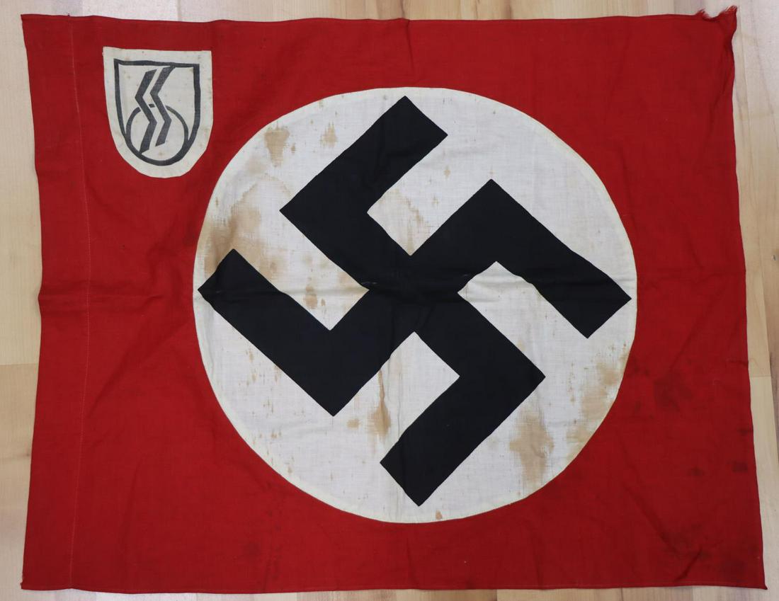 WWII GERMAN THIRD REICH SS INSIGNIA STANDARTE FLAG: 27 1/2 inches wide by 22 1/4 inches tall. Does not fluoresce. Staining on white circle. SS insignia at top left.