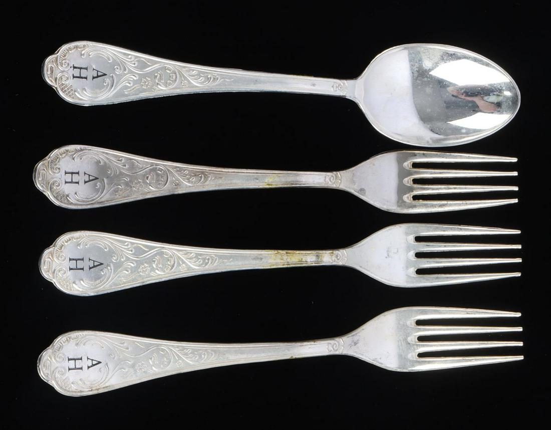 4 WWII GERMAN ADOLF HITLER FORKS AND SPOON: WWII German Adolf Hitler forks and spoon. 3 forks and 1 spoon. Handles marked AH. Reverse marked 800. Good condition with some residue on the handles. Spoon measures 7 3/4 inches and forks 7 3/4. Unau