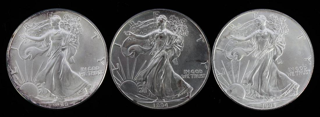 3 KEY DATE AMERICAN SILVER EAGLE 1986 1994 &1996: 3 key date American Eagle silver dollar collector lot. All brilliant uncirculated condition with some toning on the dentils. Dates 1986 first issue year, 1994 low mintage year, 1996 low mintage year. 