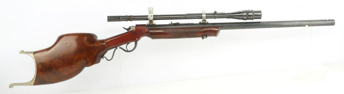 MARLIN FIREARMS .22LR FALLING BLOCK SCOPED RIFLE: Octagonal barrel measures 28 1/2 inches long and features a bright and clear bore with distinct rifling. Action is smooth and functions without issue. J. Unertl scope mounted on top with very clear op