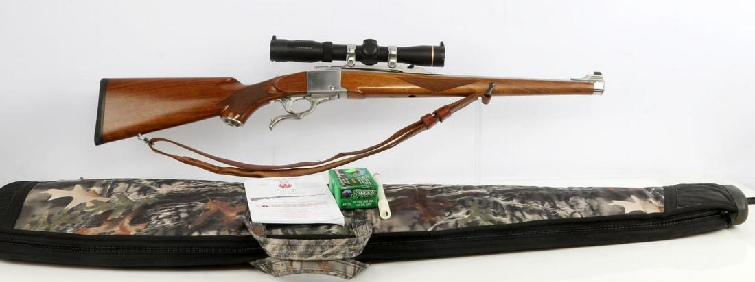 RUGER NO. 1 FALLING BLOCK 308 WIN RIFLE LEUPOLD: Barrel measures 20 inches long and features a bright and clear bore with distinct rifling. Action is smooth, as is trigger and block lever. Mounted atop is a Leupold VX- R Scout 1.5-5X33 scope with cr