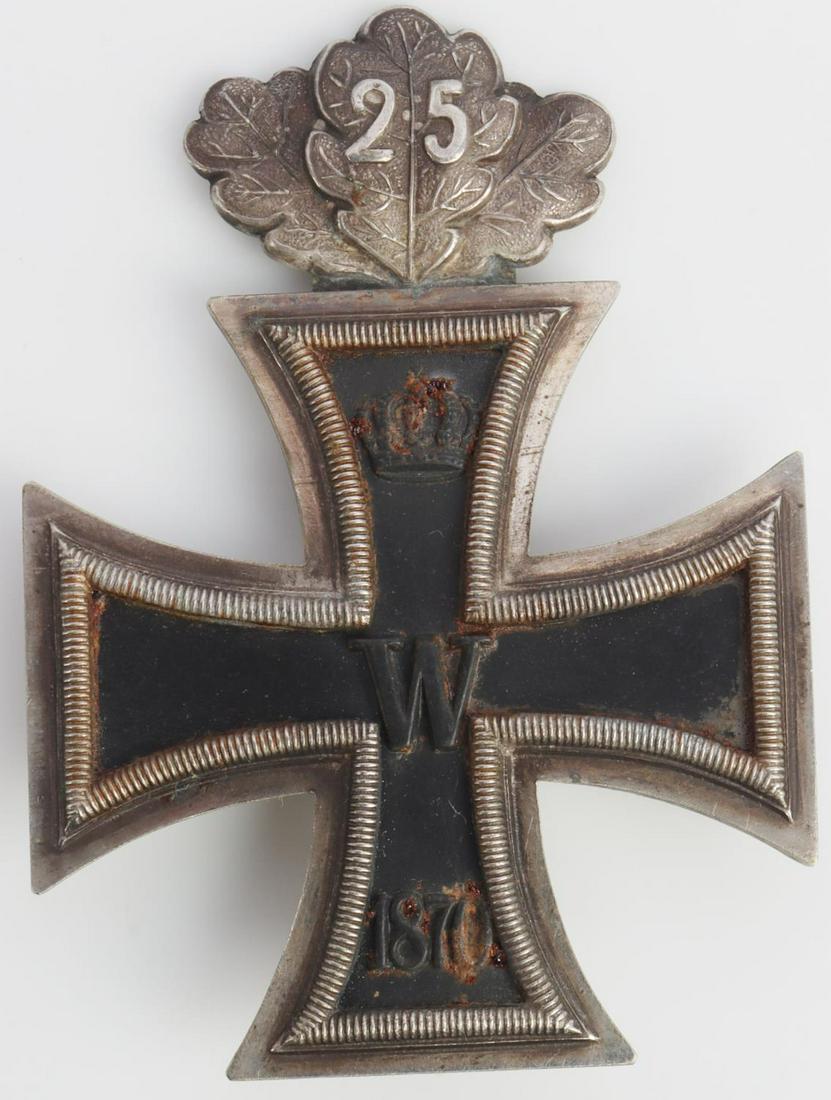 1870 FIRST CLASS IRON CROSS 25 YEAR JUBILEE LEAVES: 2 piece soldered frame with magnetic core. Jeweler attached jubilee oak leaves. Small WS stamped on pin. Very good condition with some oxidation. Measures 2 3/16 inches. This lot has a reserve.