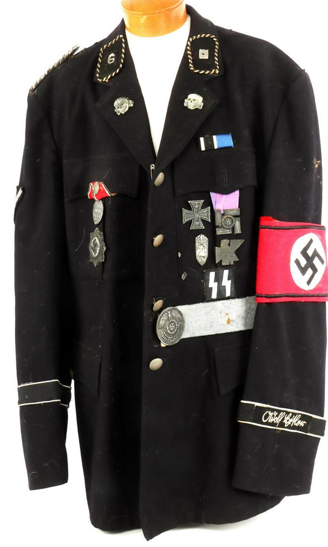 WWII GERMAN REICH SS TUNIC MOVIE PROP LARGE: Large size tunic with collar tabs, totenkopfs, German cross, WWI Iron cross, service medal, arm band. All badges and pieces on uniform are props as well.
