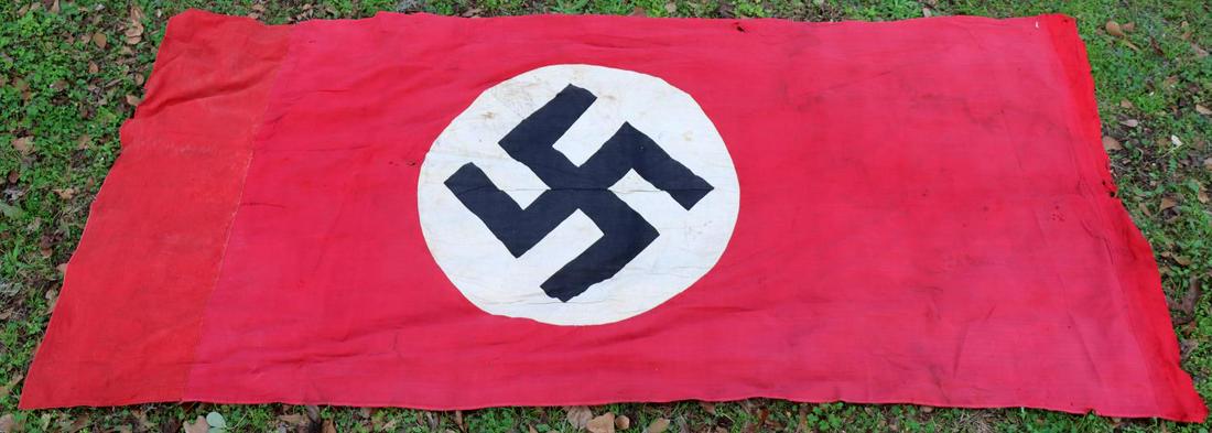 WWII GERMAN REICH LARGE NSDAP BUILDING BANNER FLAG: Measures about 100 1/2 inches tall by about 43 1/4 inches wide. Some small rips and tears throughout. One stitch repair near bottom.
