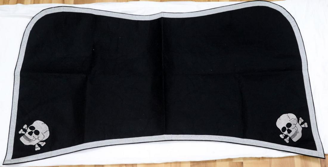 WWII GERMAN THIRD REICH SS HORSE SADDLE BLANKET: SS saddle blanket for parade use. Totenkopf represented on 2 corners with silver bullion trim. Measures 46 X 27 inches. Very good condition. Non-fluorescing This lot has a reserve.