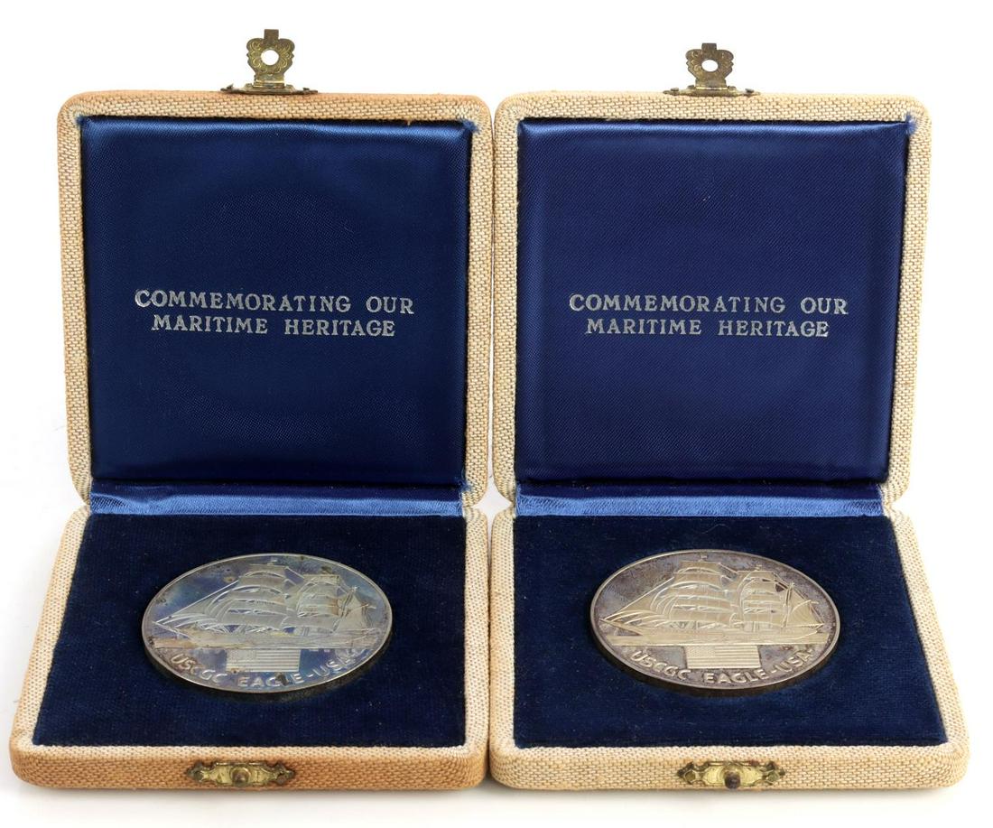 2 OP SAIL 1976 2 OXT STERLING SILVER MEDAL LOT: Boxed as issued number 1280 and 1277 each with a weight of 2 troy ounces, USCGS Eagle.