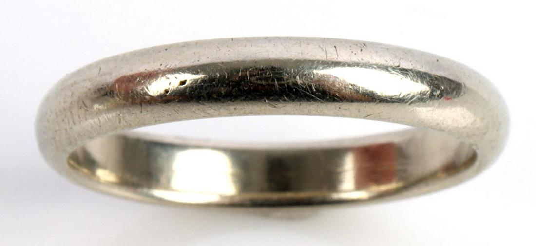 14 KT WHITE GOLD CLASSIC WEDDING BAND RING: 14kt white gold with rounded edge. Marked "14k" on shank. Weighs 3.7 grams. Size 8.5. Width of 3.4mm. This lot has a reserve.