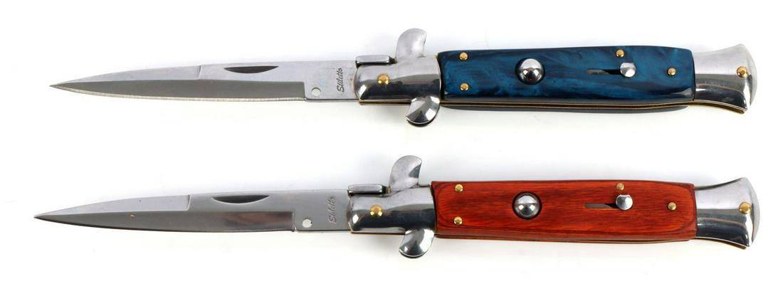 2 STILETTO SWITCHBLADE KNIFE LOT NEW: One is blue composite and the other wood. 9 1/2 inches open and 5 1/2 closed. Both new, Stiletto and stainless 440 stamped blade.