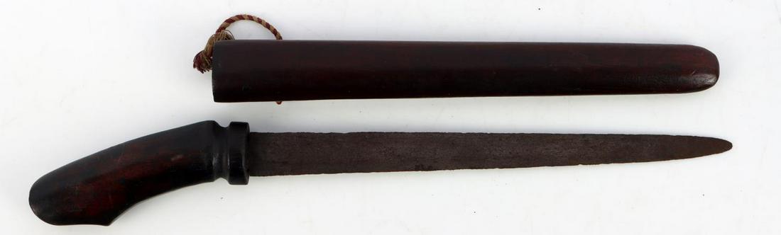 ANTIQUE 19TH CENTURY BADIK DAGGER FOR CHILD: Steel blade with wooden scabbard and grip. Measures 11 1/4 inches. Very good condition.