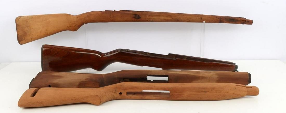 LARGE LOT WOODEN STOCK M1 GARAND M1 CARBINE: Includes two M1 Garand stocks with no markings, an m1 carbine stock and what appears to be a sort of Mauser stock. All in good condition, some adhesive left over on carbine stock.