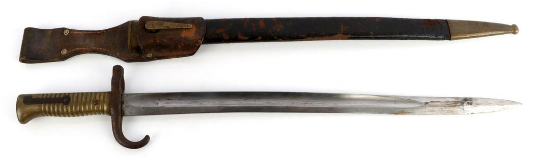 WWI FRENCH ALEX COPPEL MADE BAYONET W SCABBARD: WWI French bayonet made by Alex and Coppel in Solingen with leather scabbard and frog. Brass ribbed handle with steel crossguard. Crossguard numbered 35449 and has 13 R with a crown and a 7 below. Bla