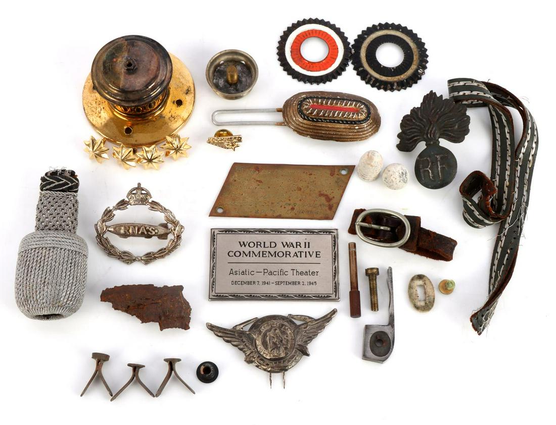 ANTIQUE ENGLISH AND GERMAN MILITARY PARTS: Variety of parts include dagger hangers, badge parts, visor and shako parts, and more. Very good condition. Measurements range 1 - 29 inches.