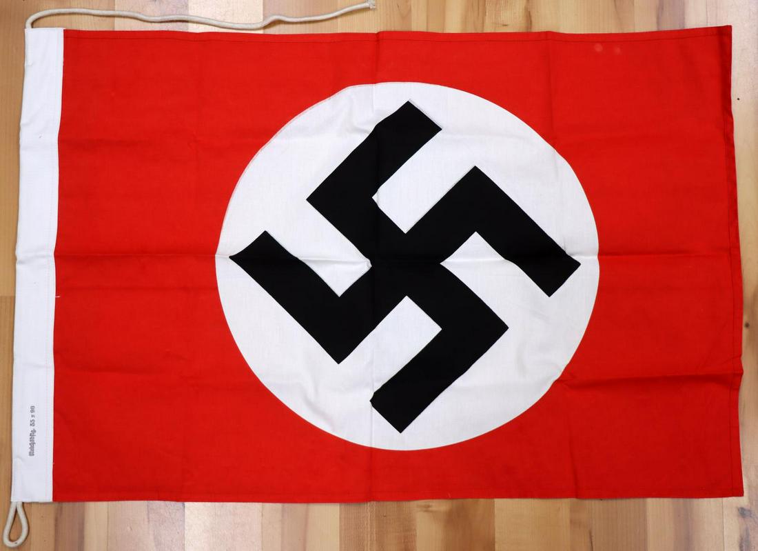 LARGE WWII GERMAN DOUBLE SIDED NSDAP PARTY FLAG: Quality reproduction. Large 36 X 24 inch double-sided service flag. Stampings on hoist. Very good overall condition. Unauthenticated, sold as is. This lot has a reserve.