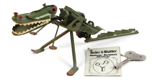 RARE TUCKER AND WALTHER TIN T REX WIND UP TOY: Rare Tucker and Walther wind up T-Rex German toy. Appears to be new.