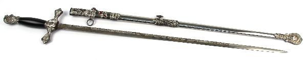 KNIGHTS OF COLUMBUS ETCHED SWORD WITH SCABBARD: Knights of Columbus ceremonial sword, complete with scabbard. Traditional K. C. decorative etching, with the name Wm Andrew DeLay. Manufactured by M. C. Lilley & Co, of Columbus Ohio. Overall very goo