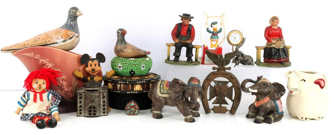 ANTIQUES ROSEVILLE CAST IRON AMISH BANK ELEPHANT: Nice grouping. Partial list includes: 6 inch Roseville Cornucopia 166-6, cast iron Amish 5 inches, cast iron bank 3 3/4 inches, sealed and appears to have silver coins inside, elephant figurines, cloc