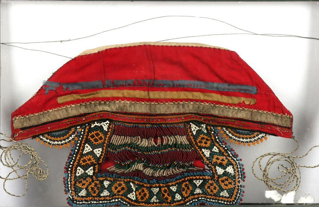 CA 1900 NATIVE AMERICAN BEADED CEREMONIAL APRON: Native American ceremonial apron. Beading is in good condition with age appropriate wear to textile. Framed measures approximately 25x17 inches, apron measures 19x13 inches.