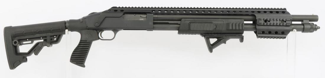 MOSSBERG 590 TACTICAL 12GA PUMP SHOTGUN: Bore is bright and clear. Action is smooth and functions without issue. Angle grip present on pump, Heat shield with tactical rails present on top. Barrel measures 20 inches long. FFL required for tra