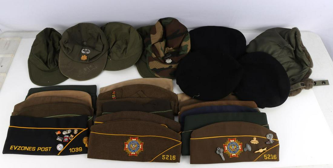 27 WWI WWII KOREA VIETNAM GARRISON & BALL CAP LOT: Big variety, lot includes: 18 Garrison caps, some dated 1940's - 1950's, a Lt. Col. still in original wrapper, VFW, Naval officer, 2 WWII navy short tally caps, 1 US Army beret with DUI, Vietnam era w
