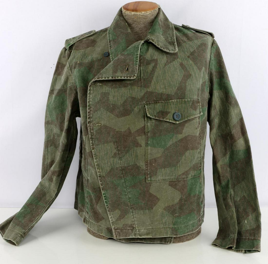 WWII GERMAN REICH SS ASSAULT GUNNER CAMO WRAP: WWII German SS camo wrap in very good condition. Does not fluoresce. No rips or tears present. Marking on inner left side reads "42 48 97 116 63" with some faded stamps that could have been Russian le
