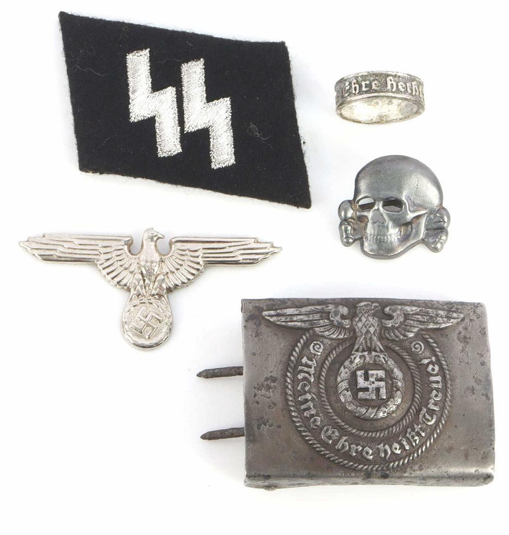 WWII GERMAN REICH SS RING BELT BUCKLE DEATH HEAD: Includes SS belt buckle, unmarked with light pitting, stamped .835 size 9 SS ring, RZM M1/52 stamped death head, collar insignia, & visor eagle.