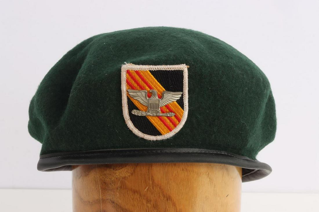 JOHN WAYNES GREEN BERET FROM 1968'S GREEN BERETS: One of Actor John Wayneâ€™s Green Berets From the Movie Green Berets. Measures 9 3/4 inches wide by 10 3/4 inches long. Has a dark green wool body. There is a Colonelâ€™s eagle mounted onto 