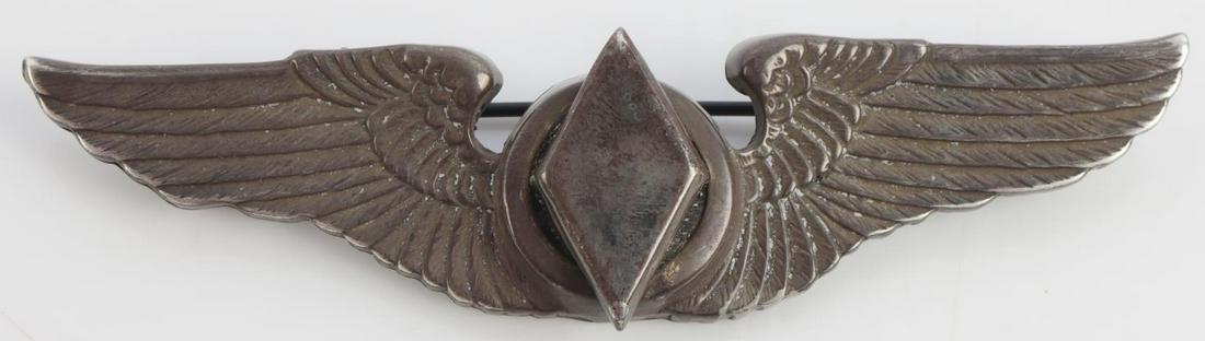 WWII USAAF WOMENS AIR SERVICE PILOT BADGE: USAAF WWII Womens Air Service WASP Pilot Wing. Measures 3” X 1” tall. The front shows a WASP diamond in the center flanked by a wing on each side. The reverse is maker marked Luxenberg New York St