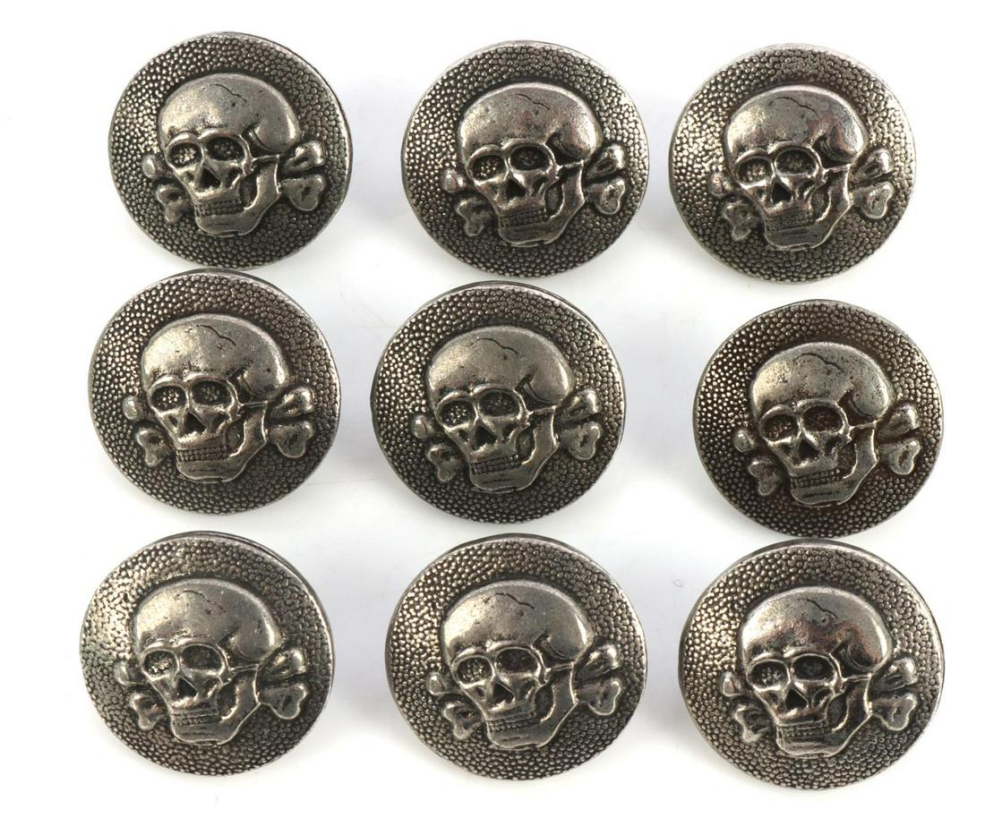 WWII GERMAN THIRD REICH SS TOTENKOPF BUTTONS: (9) German WWII Waffen SS Totenkopf Tunic Skull Buttons. They measure 3/4 inches in diameter. The front shows the Waffen SS skull and crossbones. The reverse side is maker marked ‘A RZM 155/38 SS’