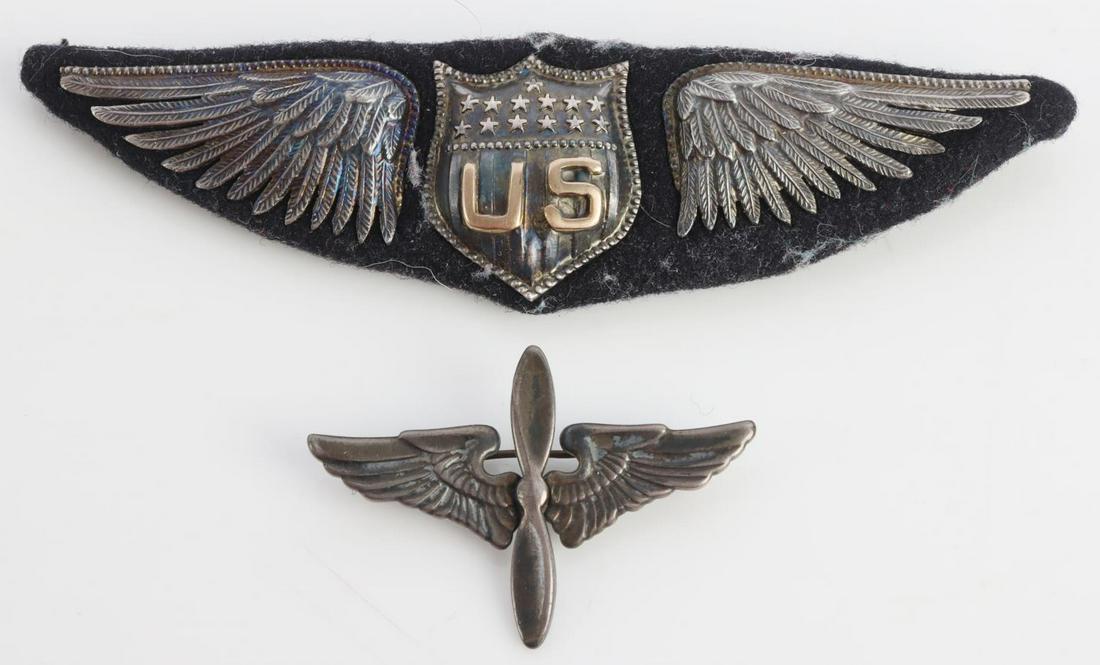 WWII GERMAN THIRD REICH AERO DALLAS PILOT WING: US WWI Aero Dallas Pilot Aviator Wing. Measures 3 3/4 X 1 inches tall. The frontshows a shield with the letters ‘US’ in the center with 13 stars above. The shield is flanked by awing on each side.