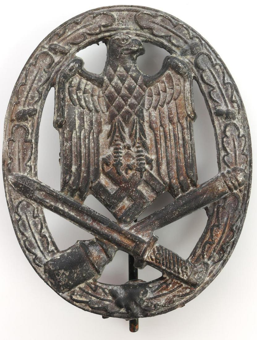 WWII GERMAN REICH HEER GENERAL ASSAULT BADGE: German WWII Army HEER General Assault Badge. The front shows a German eagle clutching a swastika in his talons in the center with a crossed bayonet & potato masher stick grenade at the base. All three