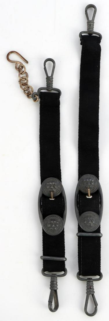 WWII GERMAN REICH KRIEGSMARINE DAGGER HANGERS: Pair of German WWII Naval Kriegsmarine Officers Dagger Hangers. The first upper onemeasures 1 5/16 inches wide by 10 3/4 inches long. The lower one measures 1 5/16 inches wide by 13 7/8 inches long. T