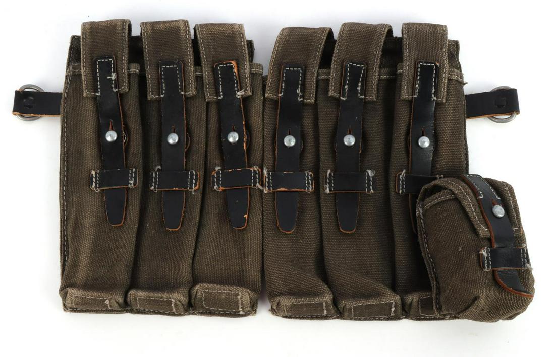 WWII GERMAN REICH MP40 MAGAZINE RIG & POUCHES: The first pouch measures 6 1/8inches wide by9 3/4 inches tall. The second pouch measures 8 5/8 inches wide by 9 3/4 inches tall. The reverse side is maker marked bml 43 MP 38 u. 40 HFH. There is a lea